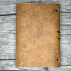 Dos du carnet de voyage en cuir camel