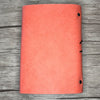Dos du carnet de voyage en cuir saumon